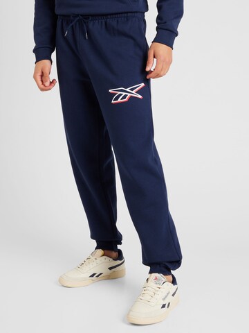 Effilé Pantalon de sport Reebok en bleu : devant