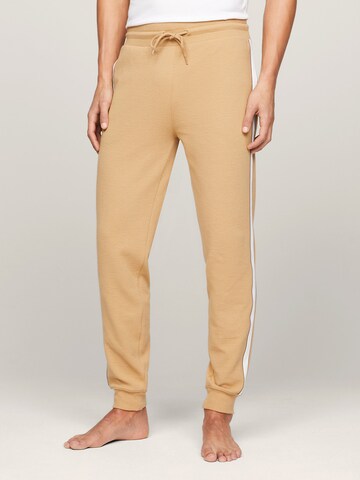 Skinny Pantalon TOMMY HILFIGER en beige : devant