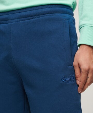Superdry Regular Trousers 'Essential' in Blue