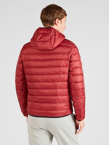 Champion Authentic Athletic Apparel Between-Season Jacket 'Legacy' in Red