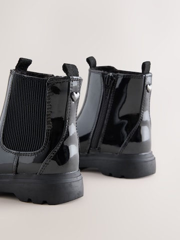 Bottes Next en noir