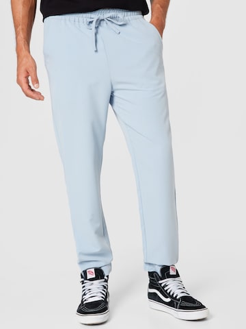 Urban Classics Tapered Pants in Blue: front