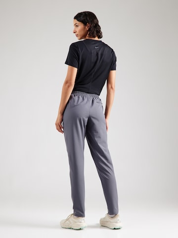 UNDER ARMOUR Tapered Παντελόνι φόρμας 'Unstoppable' σε γκρι