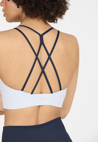 Athlecia Low Support Sport-BH 'Aspasia' in Blau