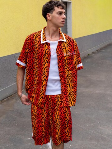 BLUE SKY INN Loosefit Broek 'Tiger' in Oranje
