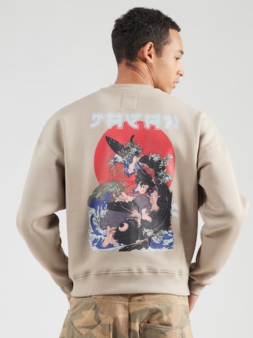 ALPHA INDUSTRIES Свитшот 'Japan Wave Warrior' в Бежевый: спереди
