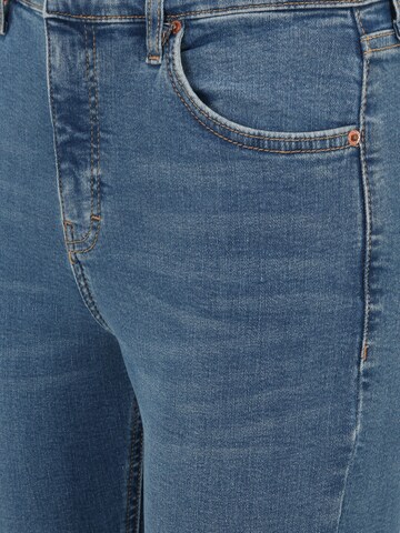 TOPSHOP Petite Flared Jeans in Blau