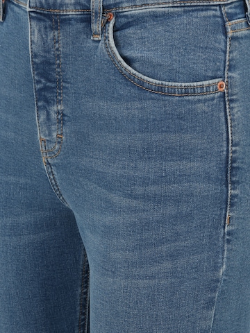 TOPSHOP Petite Flared Jeans in Blue