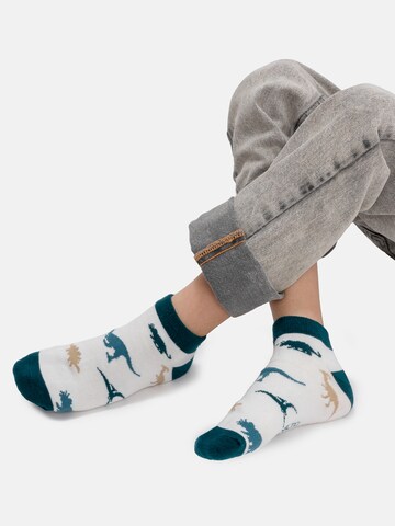 Occulto Socks 'Motivo' in Blue: front