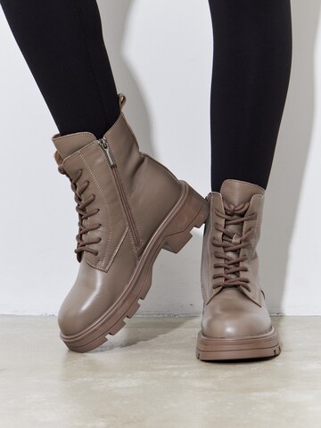 CESARE GASPARI Lace-Up Ankle Boots in Brown: front
