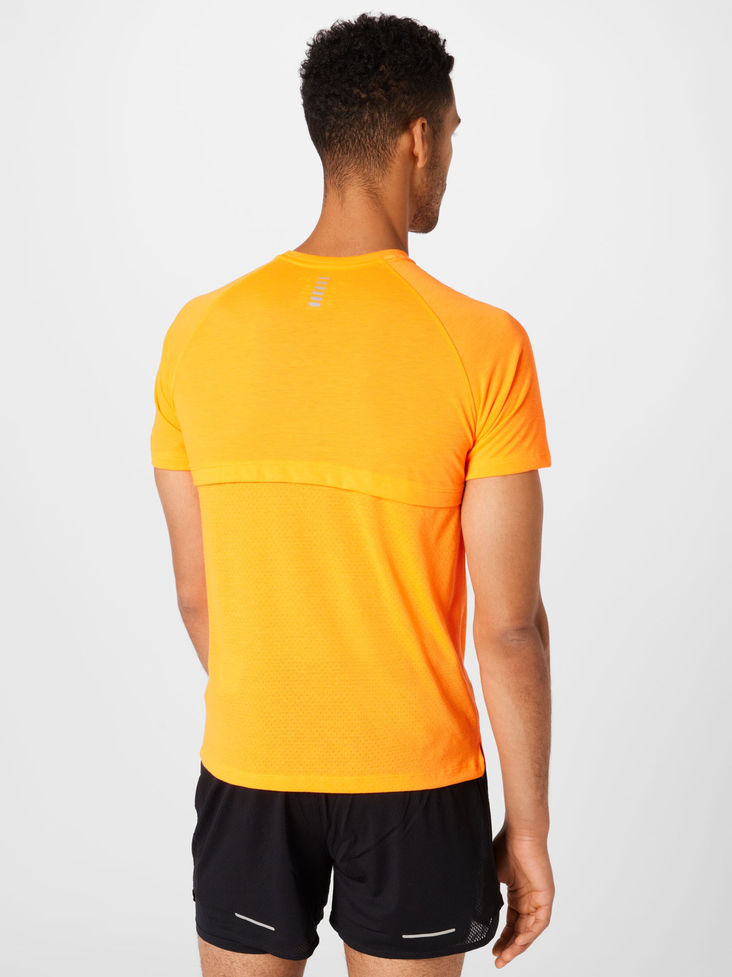 Disciplines sportives T-Shirt fonctionnel Streaker UNDER ARMOUR en Orange 
