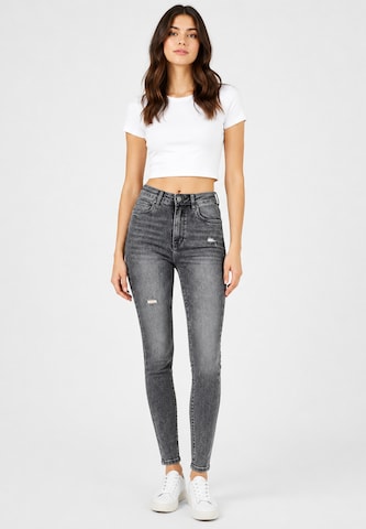 Skinny Jeans di Elara in grigio
