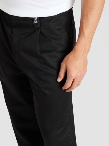 regular Pantaloni di Versace Jeans Couture in nero