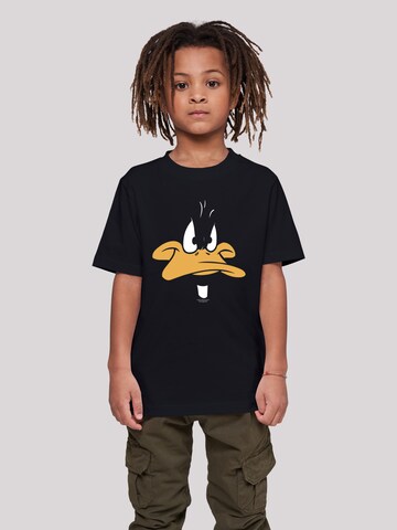 Maglietta 'Looney Tunes Daffy Duck' di F4NT4STIC in nero: frontale