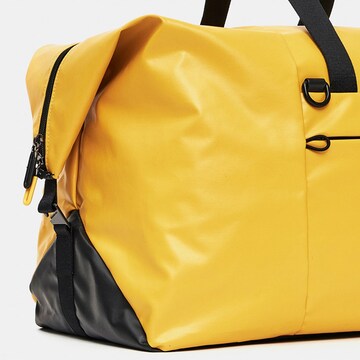 Borsa da viaggio di MANDARINA DUCK in giallo