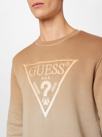 GUESS كنزة رياضية بلون بيج