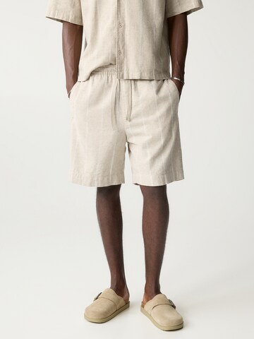 Pull&Bear Loose fit Trousers in Beige: front