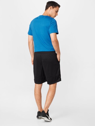 PUMA Regular Sportshorts 'TRAIN ALL DAY' in Schwarz