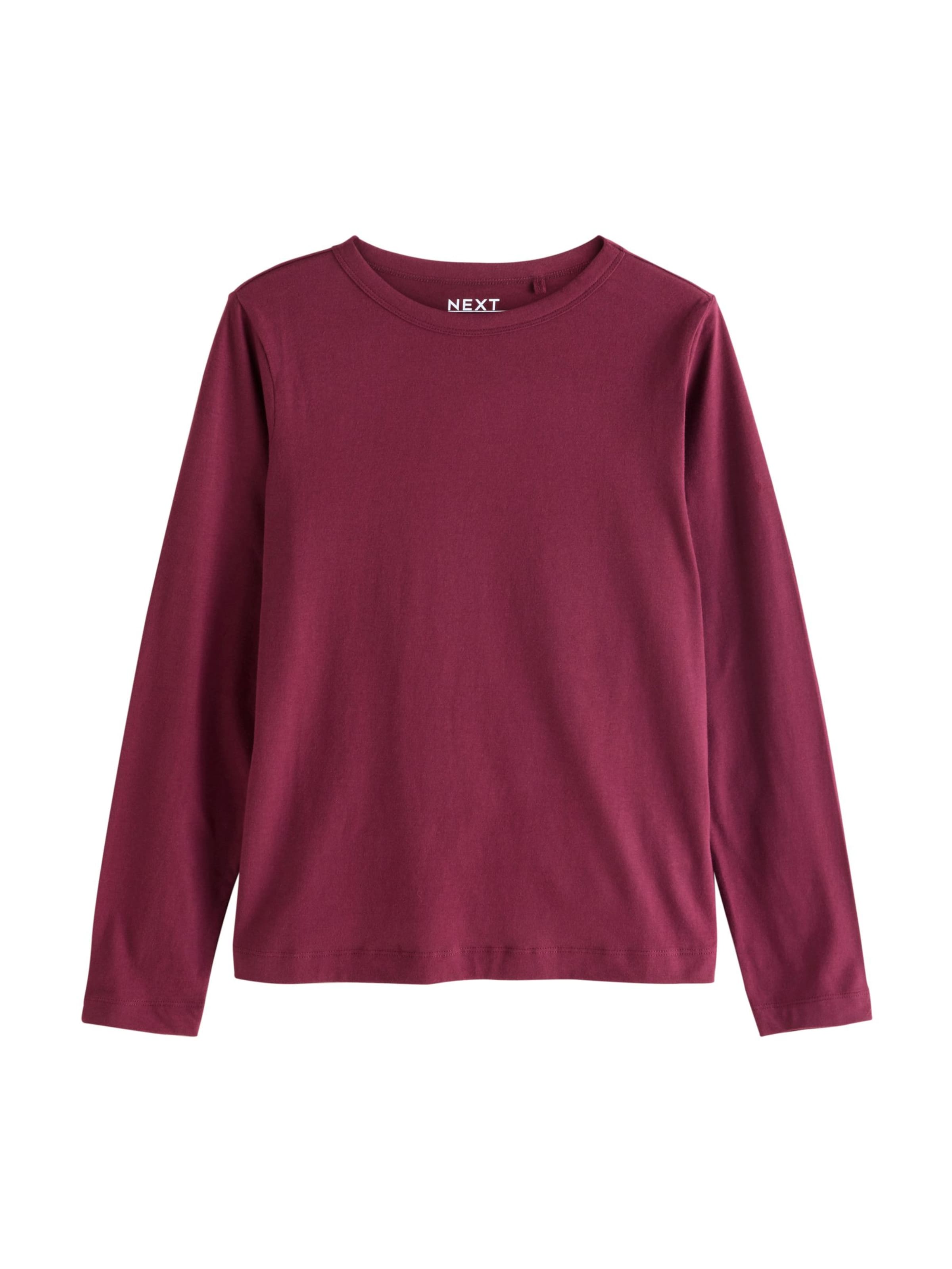 Tricou de la Next pe roșu: față