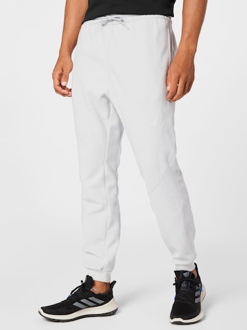 Tapered Pantaloni sport de la Reebok pe gri: față