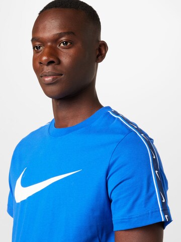 Nike Sportswear - Camisa em azul