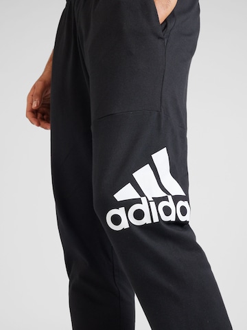 ADIDAS SPORTSWEAR Tapered Sporthose 'ESS' in Schwarz