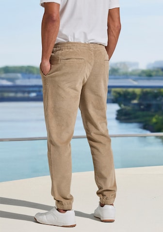 Tapered Pantaloni di JOHN DEVIN in beige