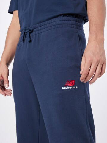Effilé Pantalon de sport new balance en bleu