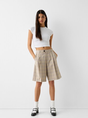 Bershka Regular Pleat-front trousers in Beige