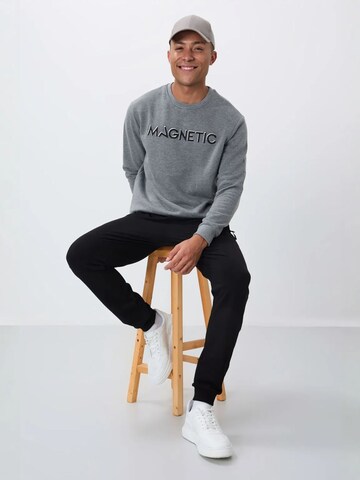 Sweat-shirt Tommy Life en gris
