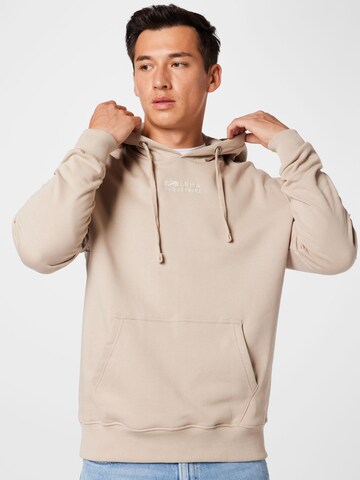 Sweat-shirt ALPHA INDUSTRIES en beige : devant