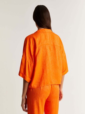 Scalpers Blus i orange