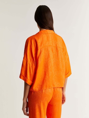 Scalpers Bluzka w kolorze pomarańczowy