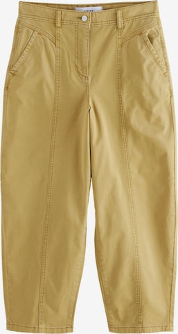 Next Loosefit Chinohousut värissä keltainen: etupuoli