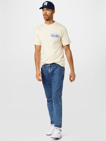 GCDS - Camiseta en beige