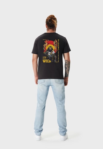 Oldskull Shirt 'Wrldvibe Return to Wild Graphic' in Black