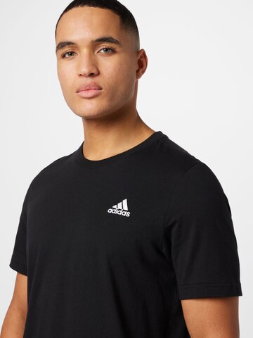 ADIDAS SPORTSWEAR Λειτουργικό μπλουζάκι 'Essentials' σε μαύρο