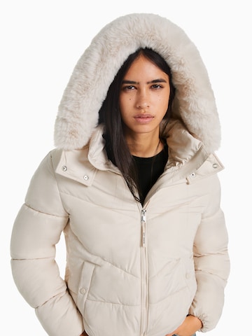 Bershka Winter jacket in Beige