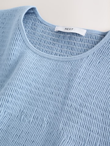 Next Mekko värissä sininen