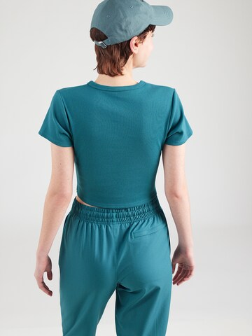 UNDER ARMOUR Koszulka funkcyjna 'Rival' w kolorze zielony