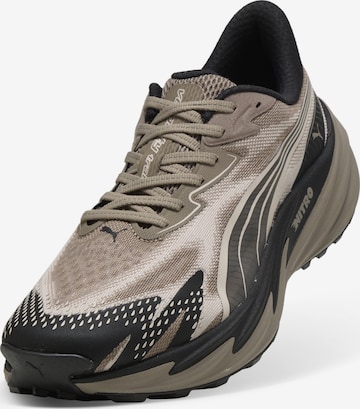 Baskets basses PUMA en beige : devant