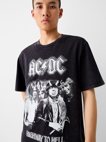 Bershka T-shirt 'ACDC' i svart