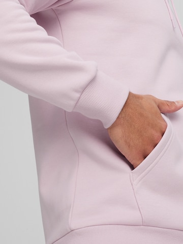 PUMA Bluzka sportowa 'ESSENTIALS+' w kolorze fioletowy