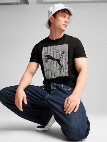 PUMA - Camiseta 'Puma Graphics Wording Tee' en negro