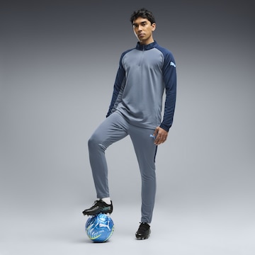 PUMA Tapered Sportbroek in Blauw: voorkant