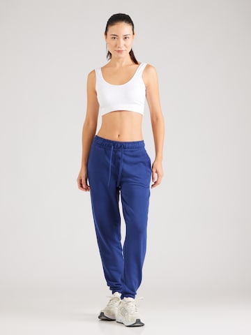 Tapered Pantaloni sportivi di 4F in blu