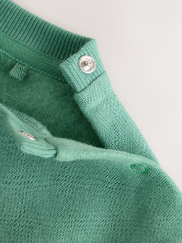 Set Next en vert