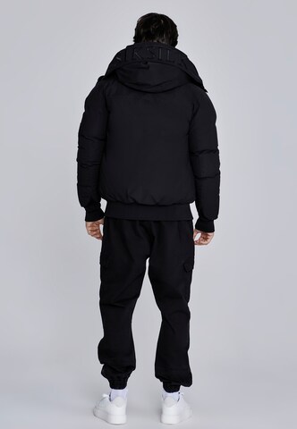 SikSilk Tussenjas in Zwart