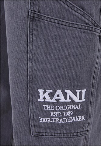 Tapered Jeans di Karl Kani in grigio