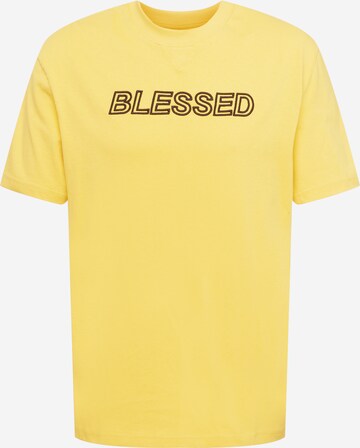 T-Shirt 'PUMA x NJR' PUMA en jaune : devant